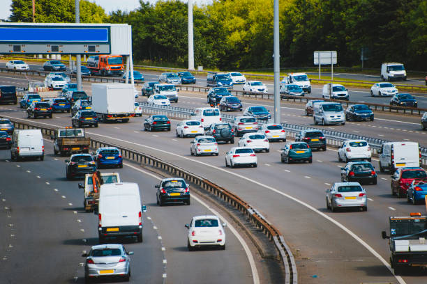 High traffic density on highway High traffic density on highway traffic car traffic jam uk stock pictures, royalty-free photos & images