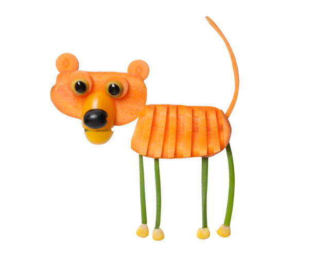 istock Tiger made of raw carrot and onion 830540142