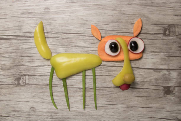 istock Surprised vegetable wolf made on wooden background 830541592
