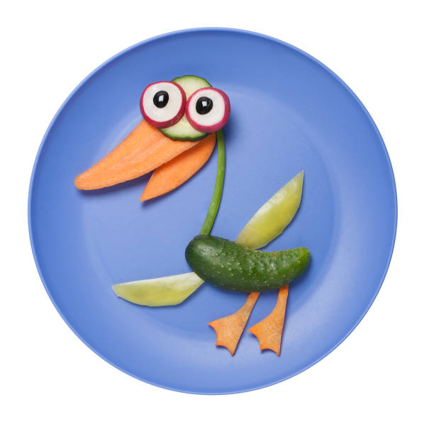 istock Funny duck made of vegetables on plate 830542856