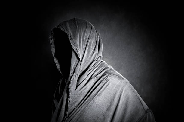 istock Ghostly figure in the dark 830546180