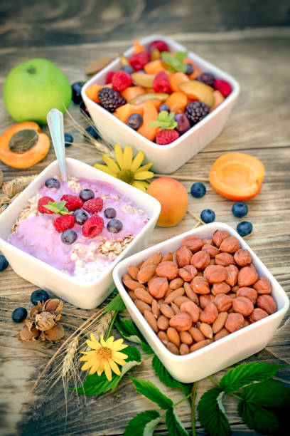 Vegetarian meal, vegetarian food - oatmeal with fruit yogurt and fruit salad