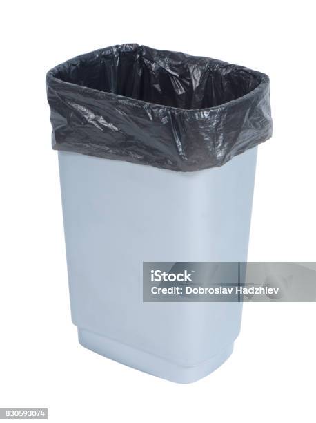Empty Trash Container With Black Plastic Bag On White Background Stock Photo - Download Image Now