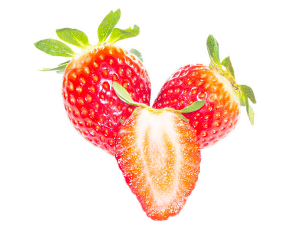 istock Fresh red strawberries on white isolated background 830594216