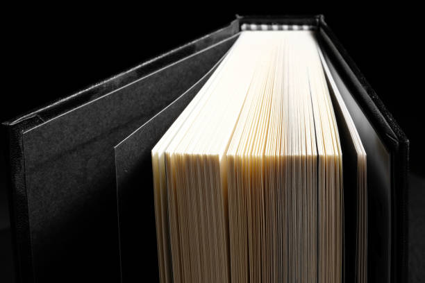istock Hardcover book in black background - Soft focus 830721196