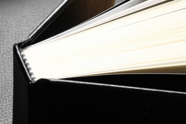 istock Hardcover book in black background - Soft focus 830721340