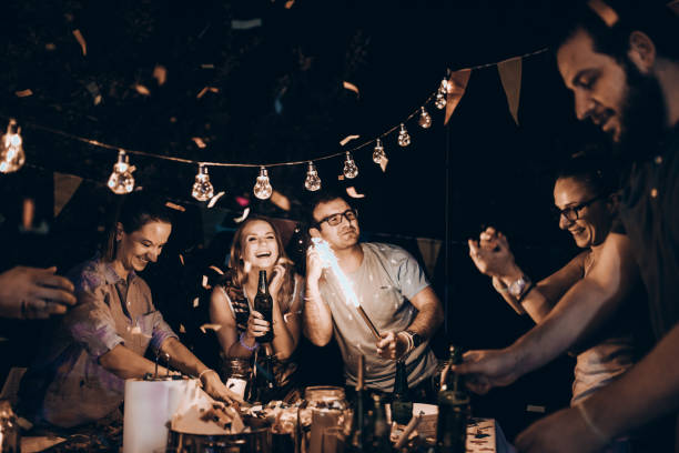 istock Happy friends at birthday party 830730056