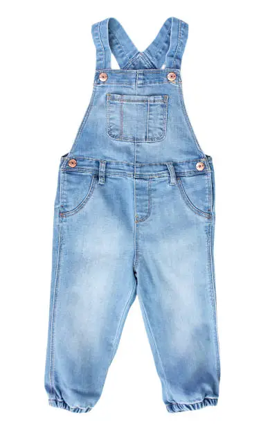 Photo of Baby toddler blue jean overall isolated on white.
