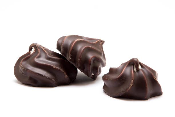 istock Marshmallows in chocolate glaze on white background 830740868