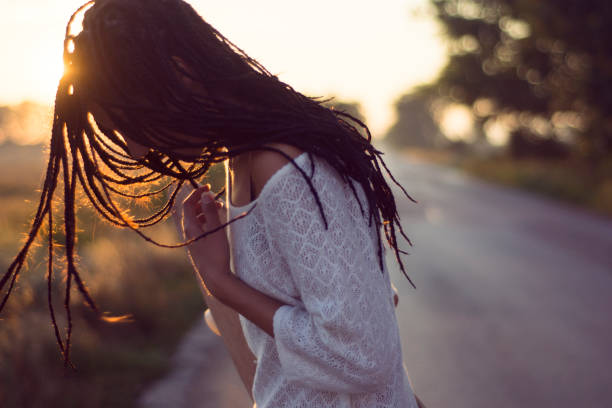 istock Braided hair and sun 830776896