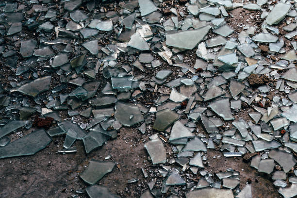 istock Shards of broken glass on floor 830792172