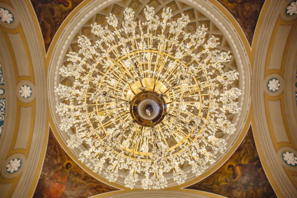 istock Large circular chandelier in Church 830792682