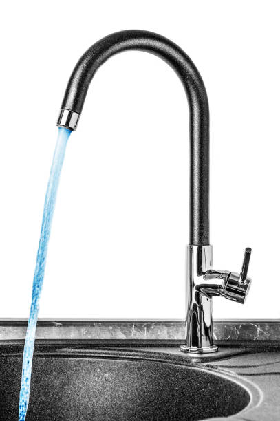 istock Modern faucet with flowing water on white background 830802204