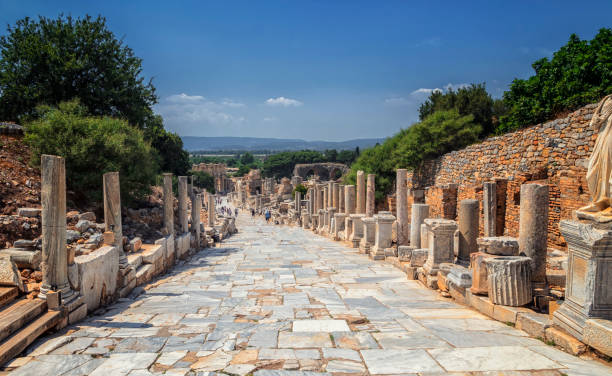 istock Ancient ruins in Ephesus Turkey - archeology background 830806314