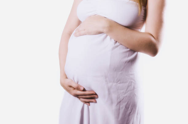 istock Close up of pregnant belly. 830806434