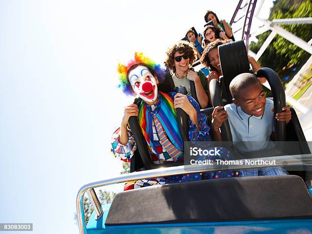 Clown And People On A Roller Coaster Stock Photo - Download Image Now - Rollercoaster, Amusement Park, People