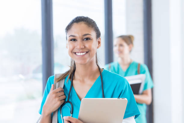 istock Confident young medical student in hospital corridor 830863232