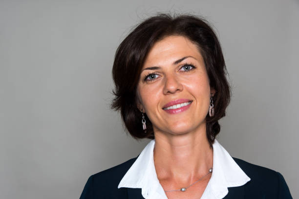 istock Smiling mature female executive 830872818