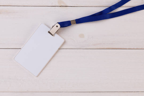 Blank Identification Card with Neckband on White Wooden Background