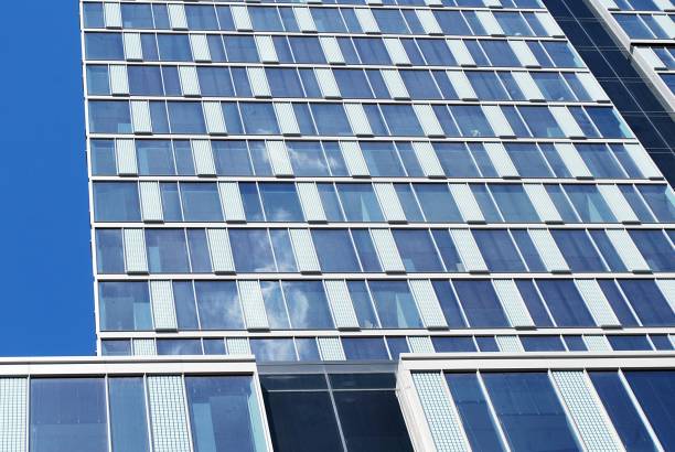 istock Modern building.Modern office building with facade of glass 830884172
