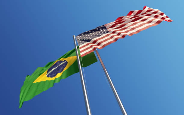 istock American and Brazilian Flags Waving With Wind: Dispute Concept 830929454