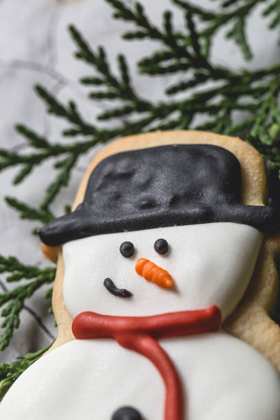 istock Christmas cookies on wooden table 830972134