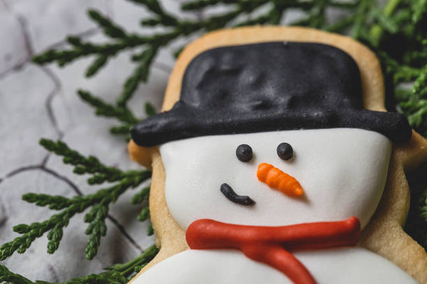 istock Christmas cookies on wooden table 830972228