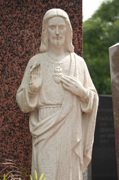istock stoned angel  statue in cemetery 830979026
