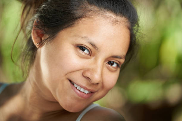 istock Headshot of smiling with teeth girl 830981214