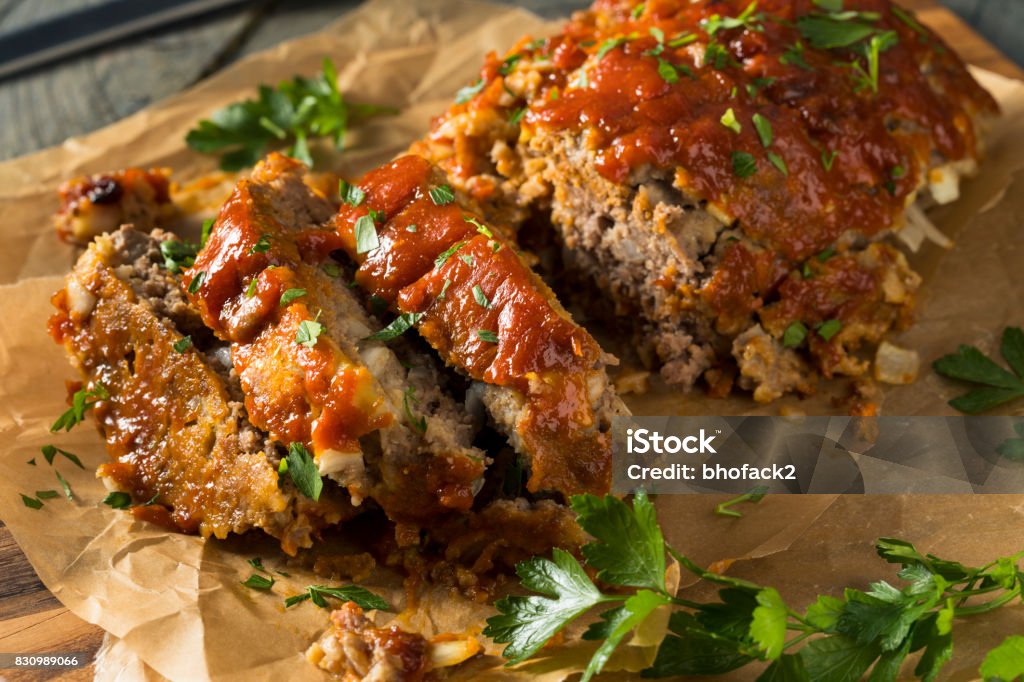 Homemade Savory Spiced Meatloaf Homemade Savory Spiced Meatloaf with Onion and Parsley Meat Loaf - Food Stock Photo