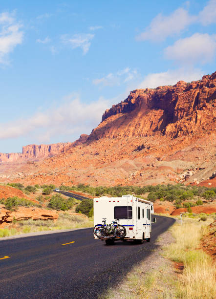 istock Road trip  - mobile home on the road 830991836
