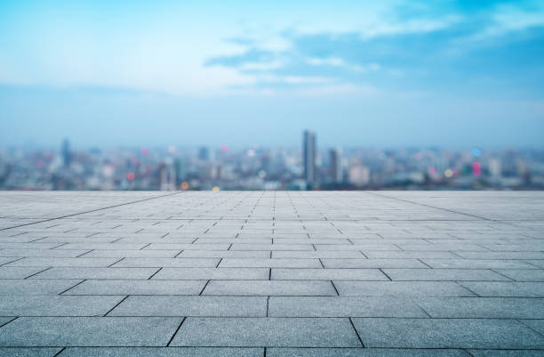 istock Panoramic skyline and buildings with empty concrete square floor 831001598