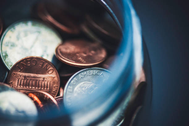 istock Savings jar filled with cash 831001840