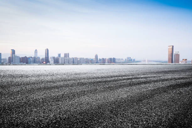 istock empty asphalt road and modern buildings in guangzhou 831002036
