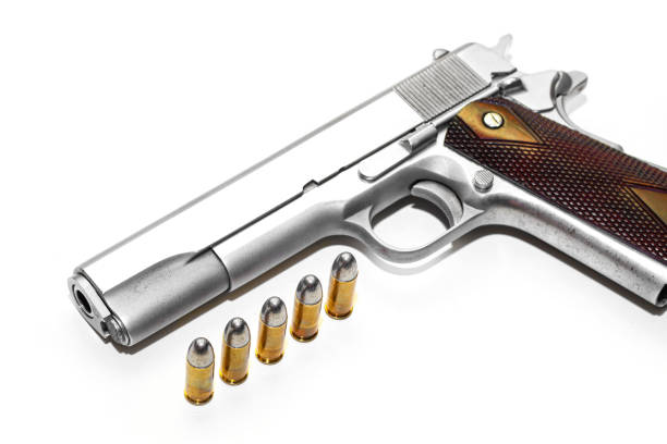 istock Automatic gun pistol with bullet in white background 831004932