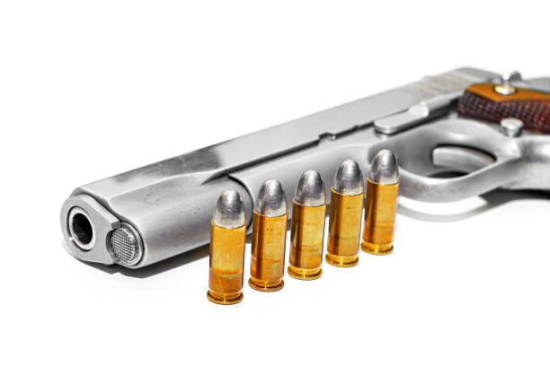 istock Automatic gun pistol with bullet in white background 831004948