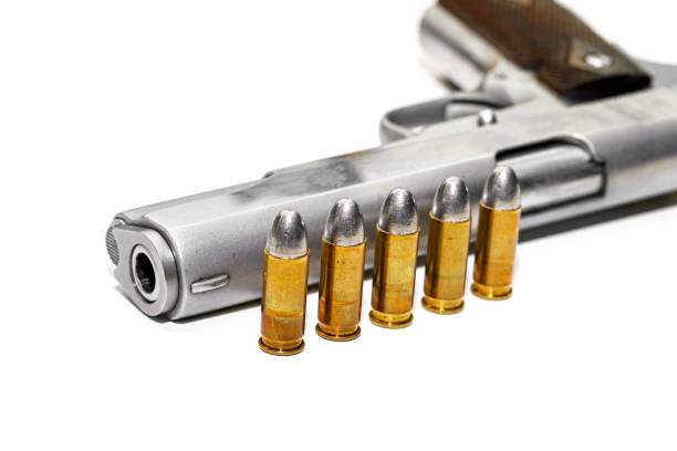 istock Automatic gun pistol with bullet in white background 831004958