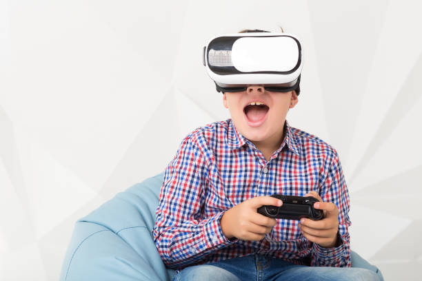 istock Emotional boy in virtual reality glasses on white background 831013176