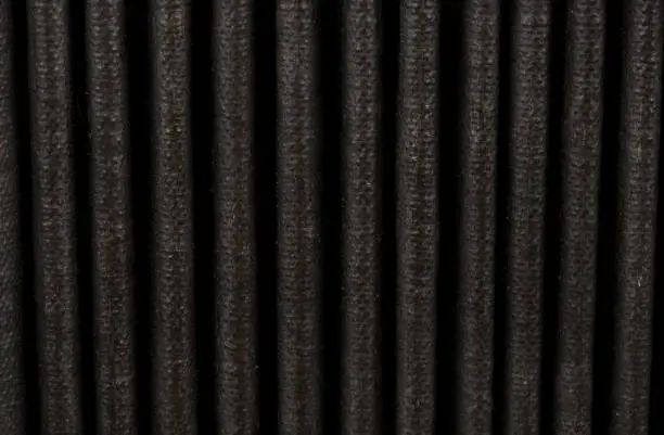 Background of corrugated bellows of an accordion closeup