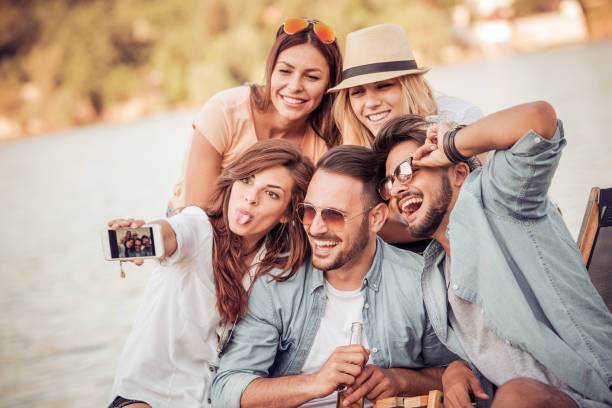 istock Friends having fun on the beach 831027060