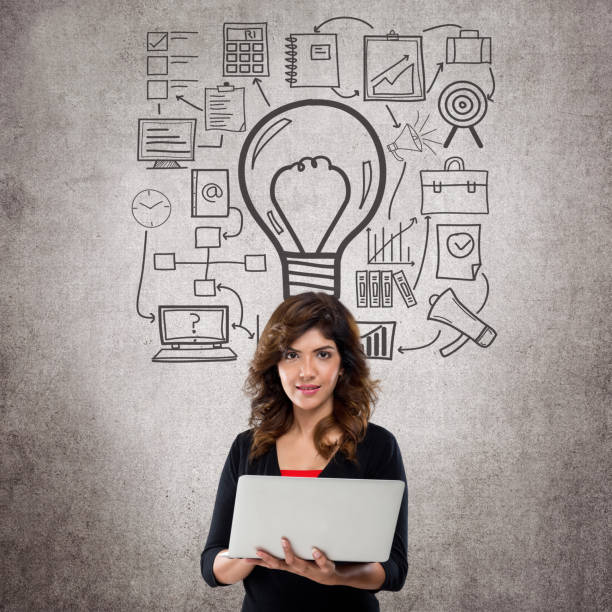 istock Businesswoman holding laptop 831028764