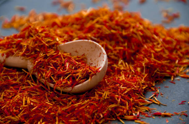 istock Exotic red hot spice, saffron for coloring food. background. isolated 831035268