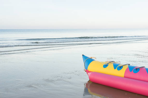 istock Banana Boat on the beach 831035484