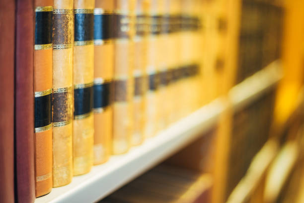 istock Aged Ancient Old Vintage Books On A Shelfs In Library 831035502