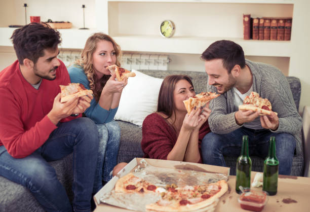 istock Friends having fun at home 831035652