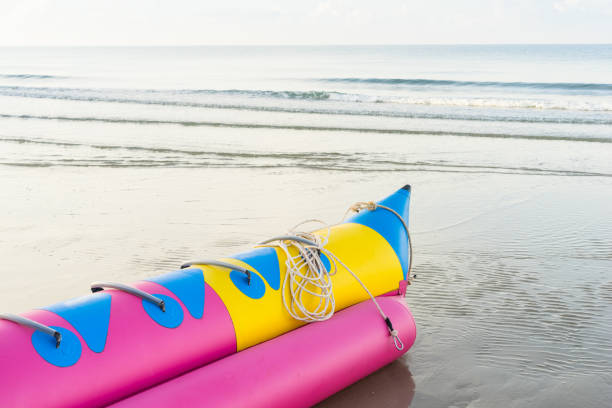 istock Banana Boat on the beach 831035658