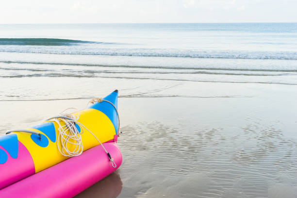 istock Banana Boat on the beach 831035664