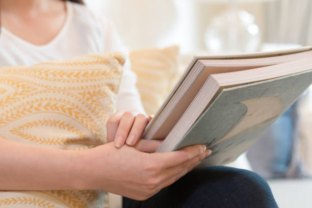 istock young beautiful asian woman with books 831035708