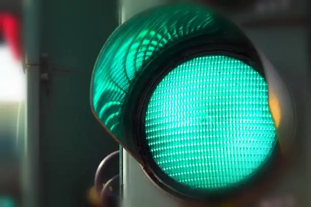 Close up view of green color on the traffic light.