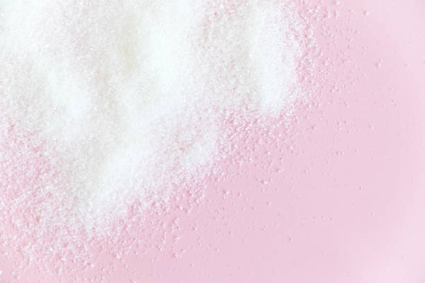 White sugar isolated on white background stock photo